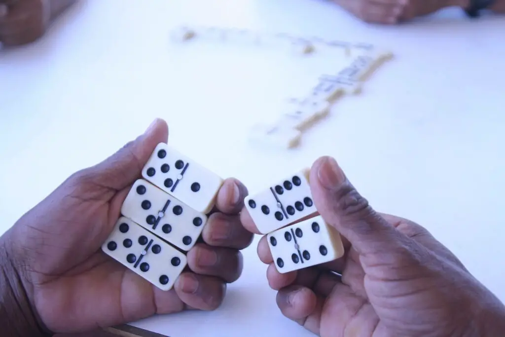 playing dominoes image